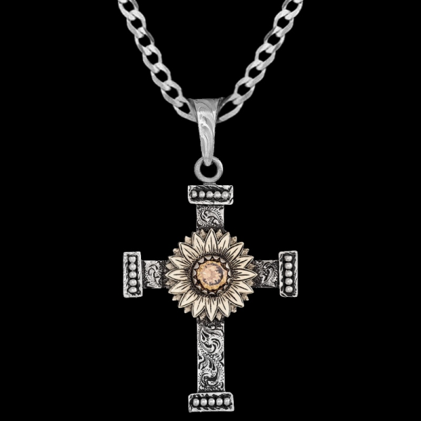 The Kings Cross Pendant Necklaces features a magnificent hand engraved german silver base with beaded edges and a bronze sunflower figure in the center. Pair it with a special discount sterling silver chain today!